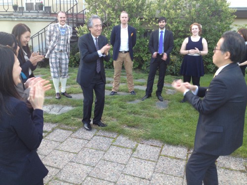 Ambassador Seiji Morimoto and minister Hideki Ishizuka show off how to do the san-san-nana